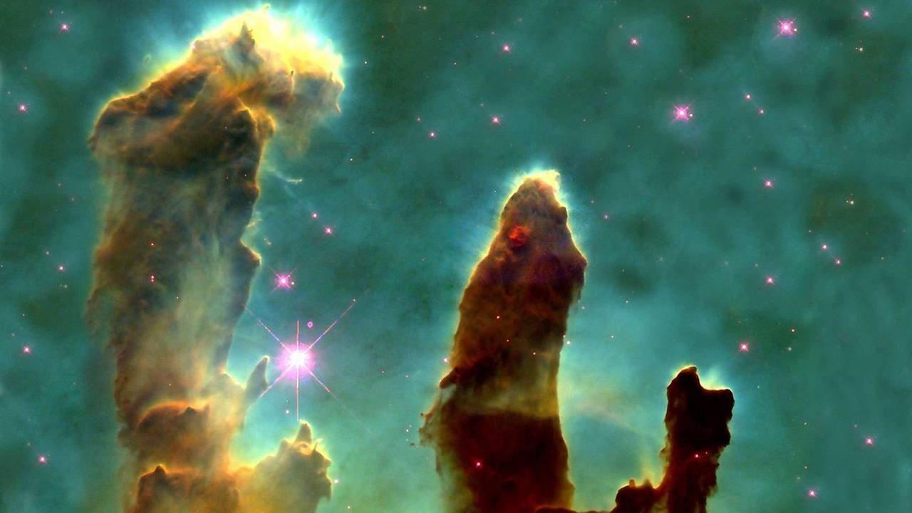 M16 mit den berühmten "Säulen der Schöpfung" - eine Hubble-Ikone