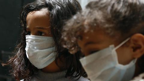 Children wearing masks are seen in Sanaa, Yemen, March 15, 2020. YEMEN-SANAA-COVID-19 nieyunpeng