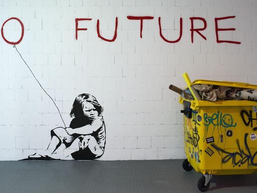 Das Graffiti "No Future" von Banksy zeigt ein Mädchen mit einem Ballon in der Hand, der der "O" in den Worten "No Future" bildet.