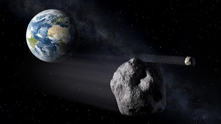 Da geht alles gut: Ein Asteroid mit Mond zieht knapp an der Erde vorbei (Illustration)