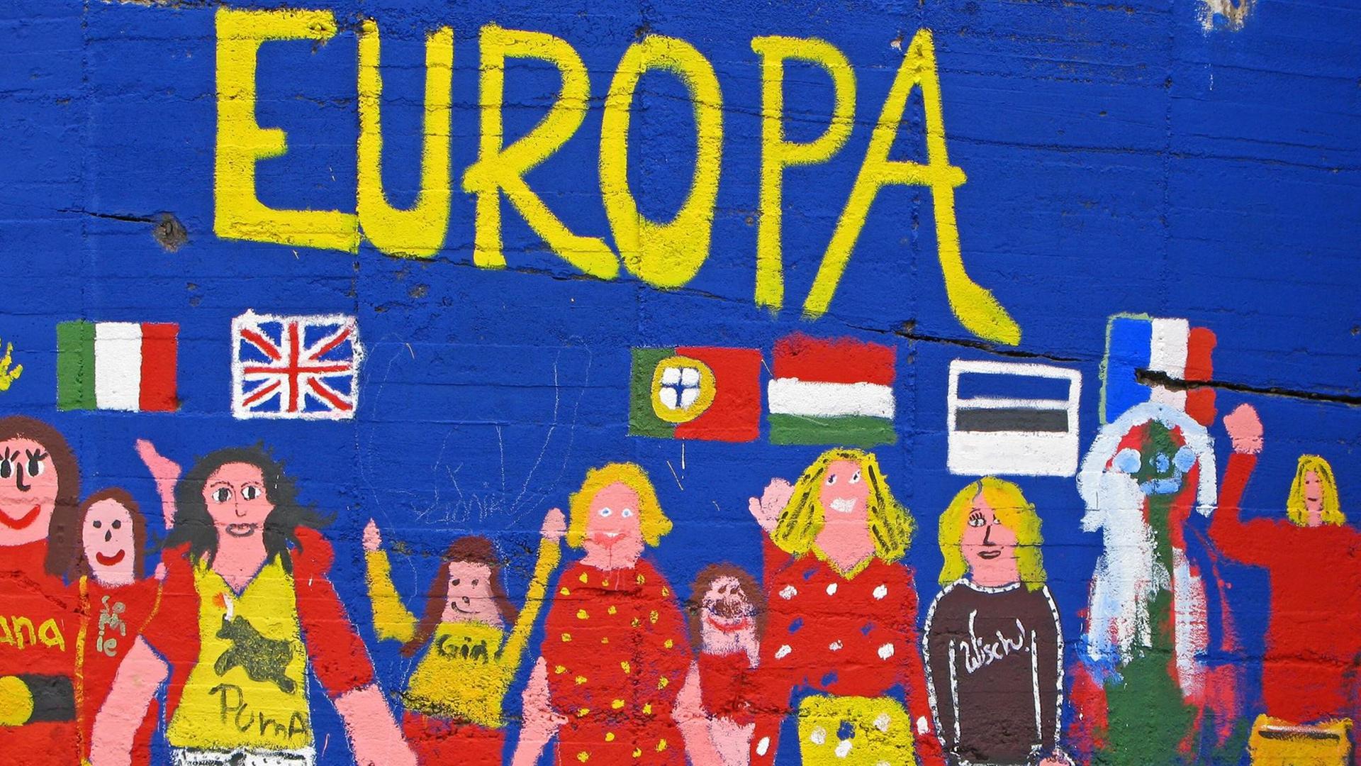 Bunte Wandmalerei: Menschen halten sich an den Händen. Darüber steht: "Europa".