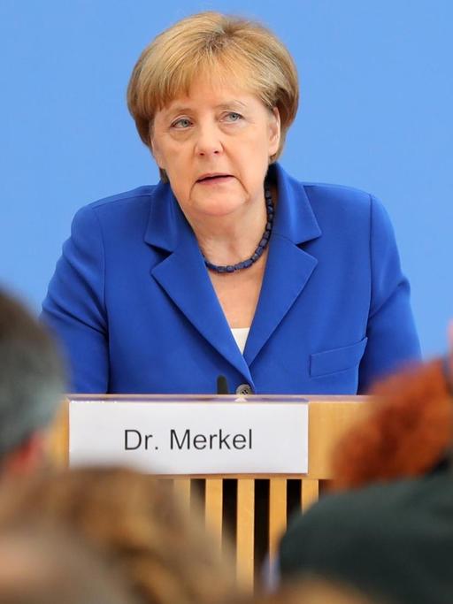 Bundeskanzlerin Angela Merkel (CDU) spricht am 28. Juli 2016 vor Journalisten in Berlin.