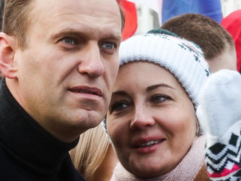 MOSCOW, RUSSIA - FEBRUARY 29, 2020: Opposition activist Alexei Navalny with wife Yulia take part in a memorial march marking the 5th anniversary of the assassination of opposition activist Boris Nemtsov. Boris Nemtsov was shot dead in central Moscow on 27 February 2015. Five men were convicted in 2017 for being hired to murder Nemtsov. Sergei Fadeichev/TASS