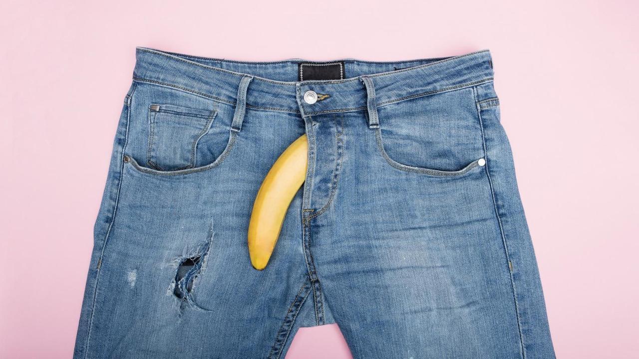 Illustration: Eine Banane guckt aus dem Hosenschlitz einer Jeans heraus.