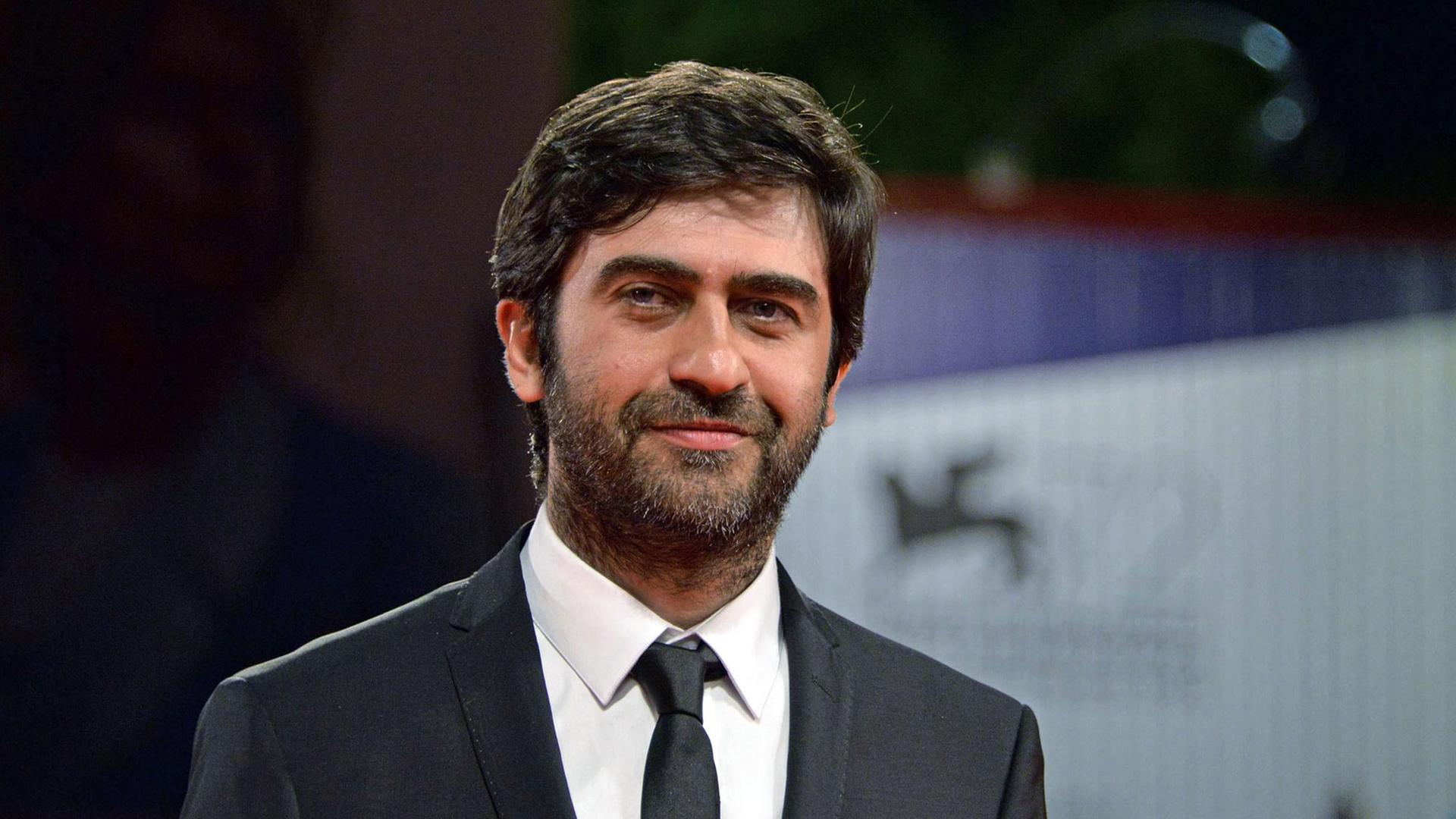 epa04920994 Turkish director Emin Alper arrives for the premiere of 'Abluka (Frenzy)' at the 72nd annual Venice International Film Festival, in Venice, Italy, 08 September 2015. The movie is presented in the official competition 'Venezia 72' at the festival running from 02 September to 12 September. EPA/ANDREA MEROLA