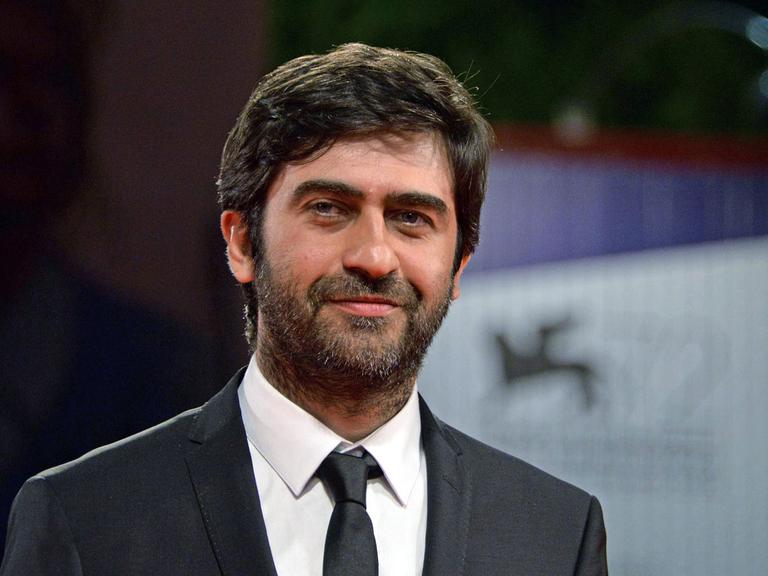 epa04920994 Turkish director Emin Alper arrives for the premiere of 'Abluka (Frenzy)' at the 72nd annual Venice International Film Festival, in Venice, Italy, 08 September 2015. The movie is presented in the official competition 'Venezia 72' at the festival running from 02 September to 12 September. EPA/ANDREA MEROLA