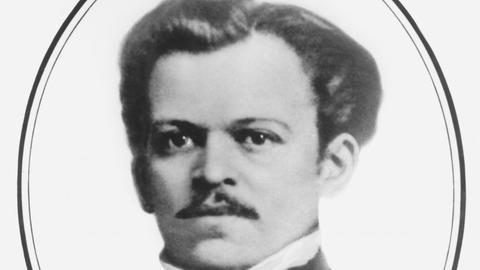 Ein schwarz-weßes Porträtfoto des Sprachlehrers und Verlegers Gustav Langenscheidt