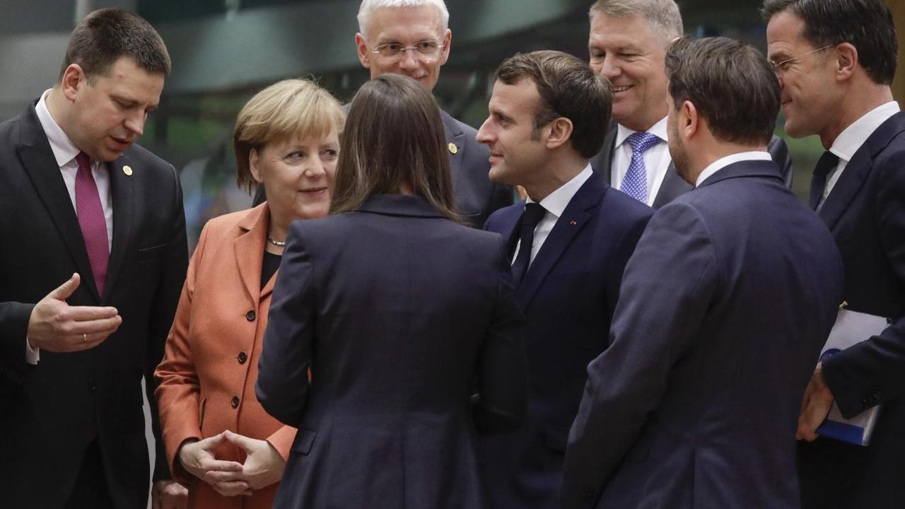Angela Merkel, Emmanuel Macron und Mark Rutte am 12. Dezember 2019 in Brüssel.