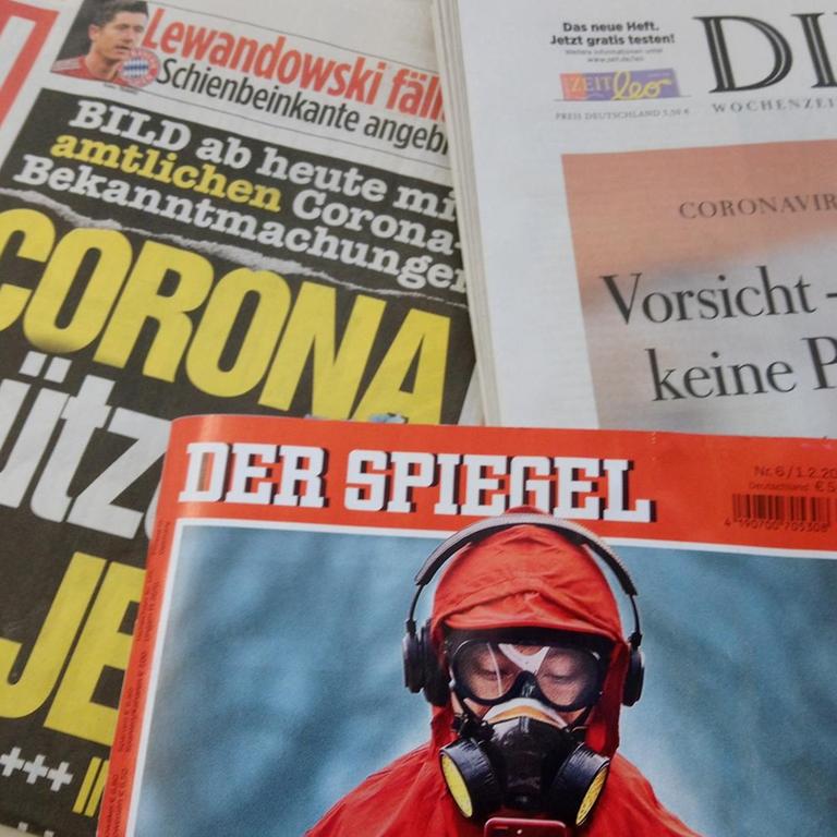 Zeitungen und Zeitschriften (Bild, Spiegel, Zeit), die das Coronavirus thematisieren