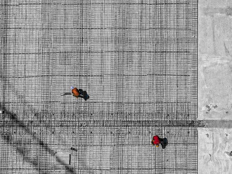 Arbeiter auf einer Baustelle.