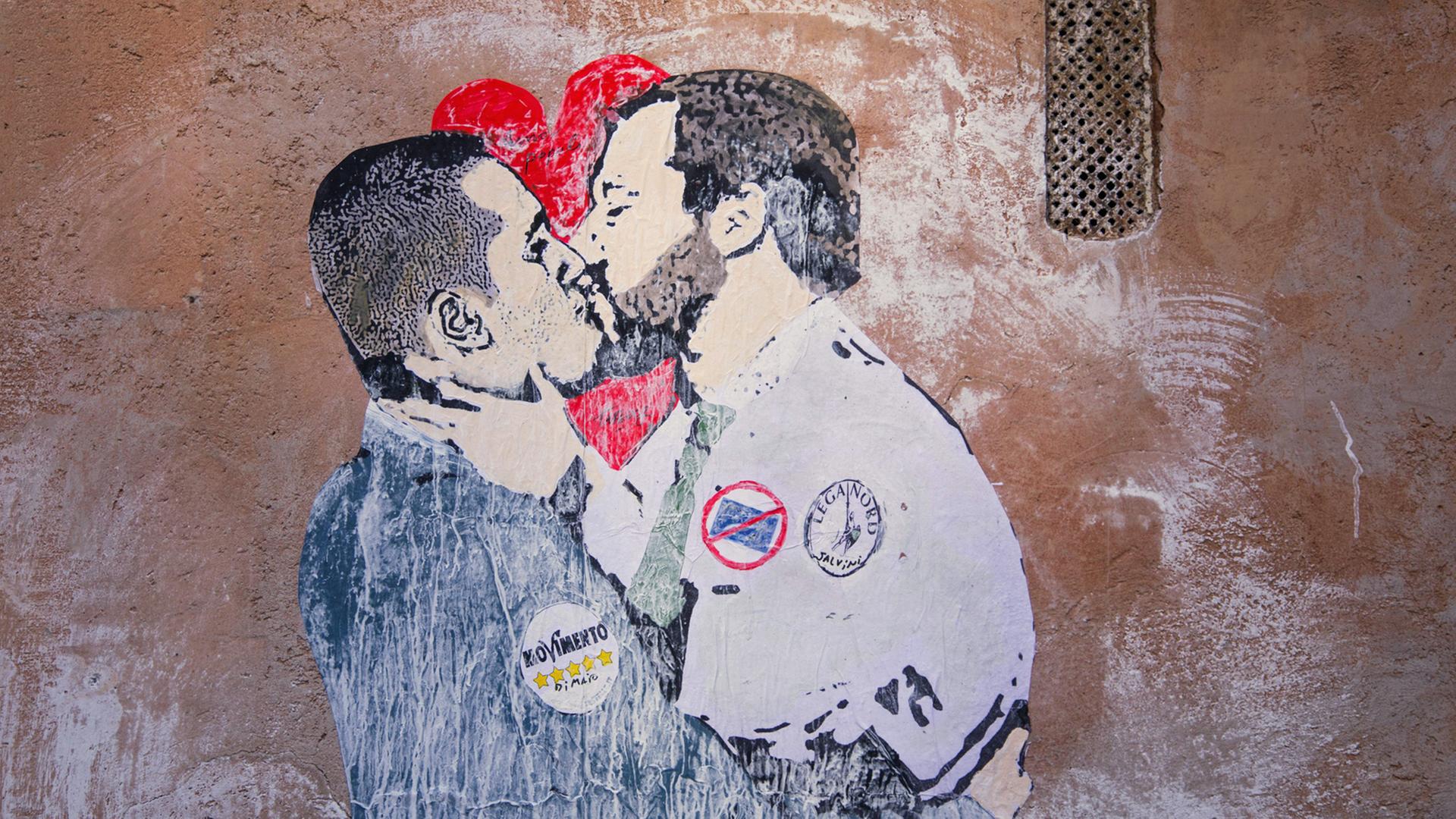 Ein Streetart-Motiv in Rom kommentiert die Regierungsbildung von Luigi di Maio, Parteichef der Fünf-Sterne-Bewegung, und Matteo Salvini, Vorsitzender der rechtspopulistischen Partei Lega, aufgenommen am 23.3.2018