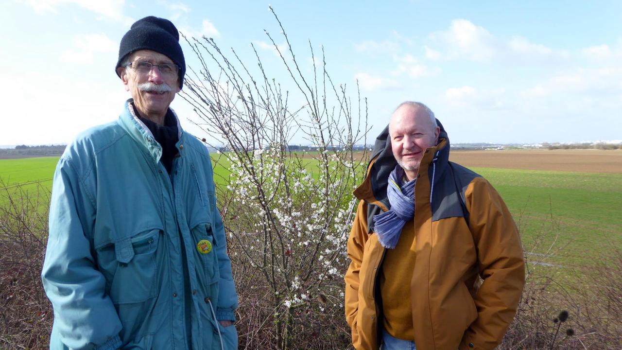 Bernard Loup (links) und Jean-Yves Souben wollen die fruchtbaren Felder von Gonesse erhalten. Ein Gericht hat ihnen Recht gegeben.  