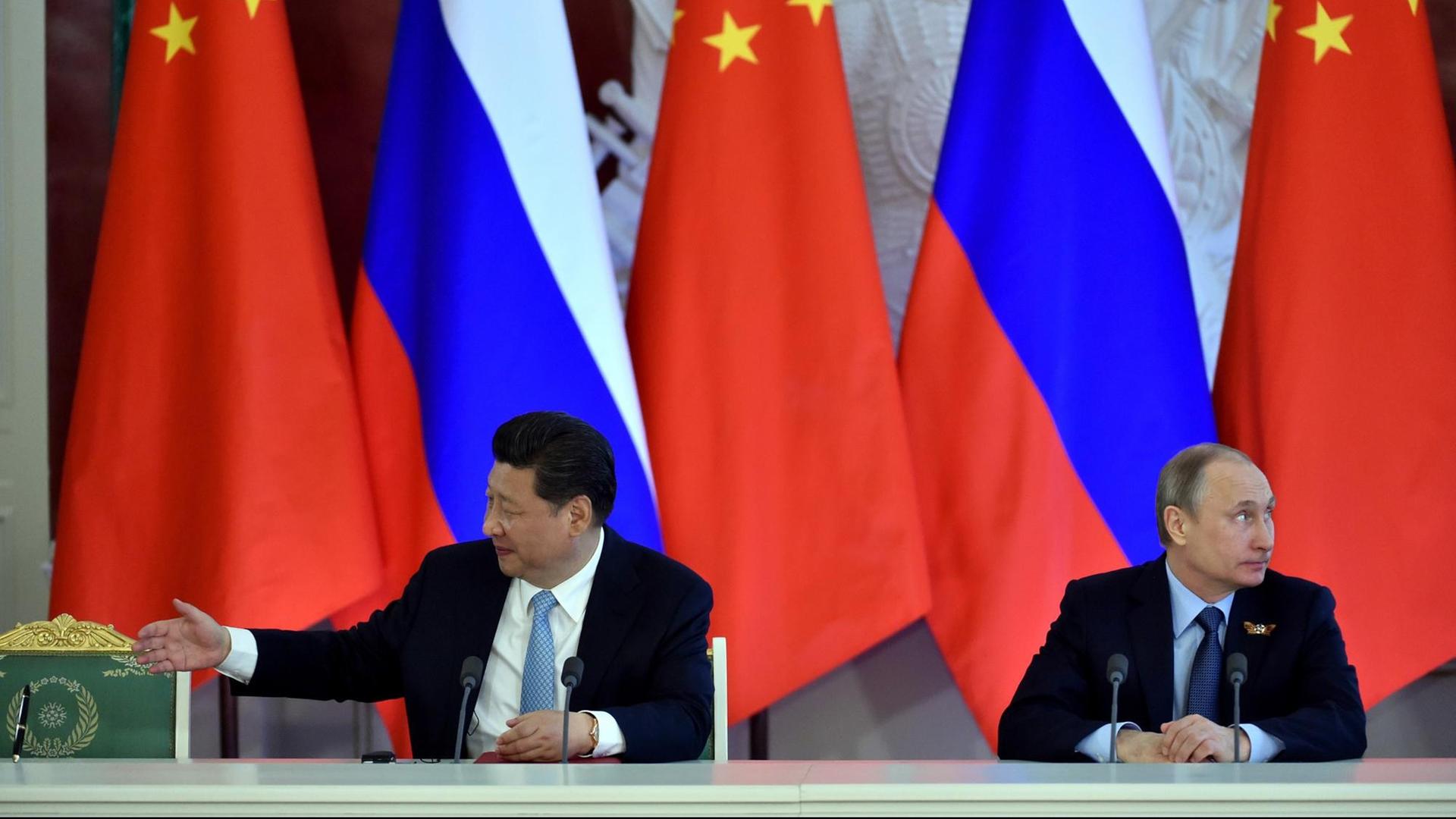 Der chinesische Präsident Xi Jinping und sein russischer Amtskollege Wladimir Putin während eines Treffens in Moskau.