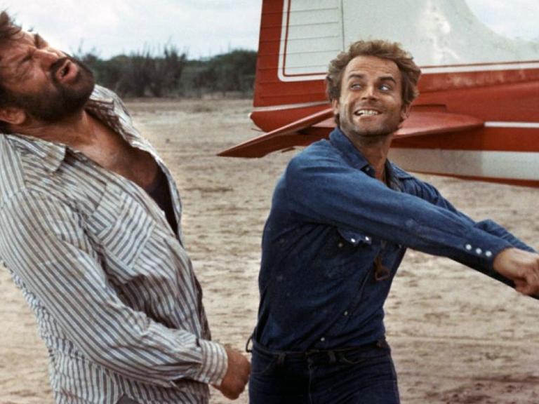 Bud Spencer (l.) und Terence Hill bei den Dreharbeiten zum Film "Zwei Himmelhunde auf dem Weg zur Hölle" von 1973