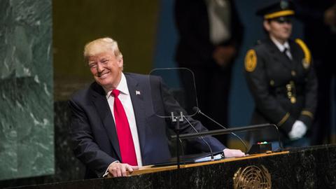 (180925) -- UNITED NATIONS, Sept. 25, 2018 -- U.S. President Donald Trump (Front) reacts as audiences laugh during his speech at the General Debate of the 73rd session of the United Nations General Assembly at the UN headquarters in New York, on Sept. 25, 2018. ) UN-73RD GENERAL ASSEMBLY-GENERAL DEBATE WangxYing PUBLICATIONxNOTxINxCHN