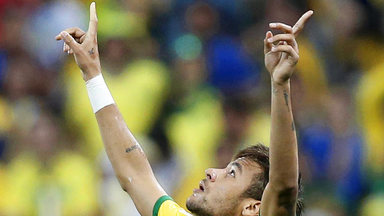 Brasiliens Neymar mit Jubelgeste im Nationaltrikot Brasiliens Neymar mit Jubelgeste im Nationaltrikot
