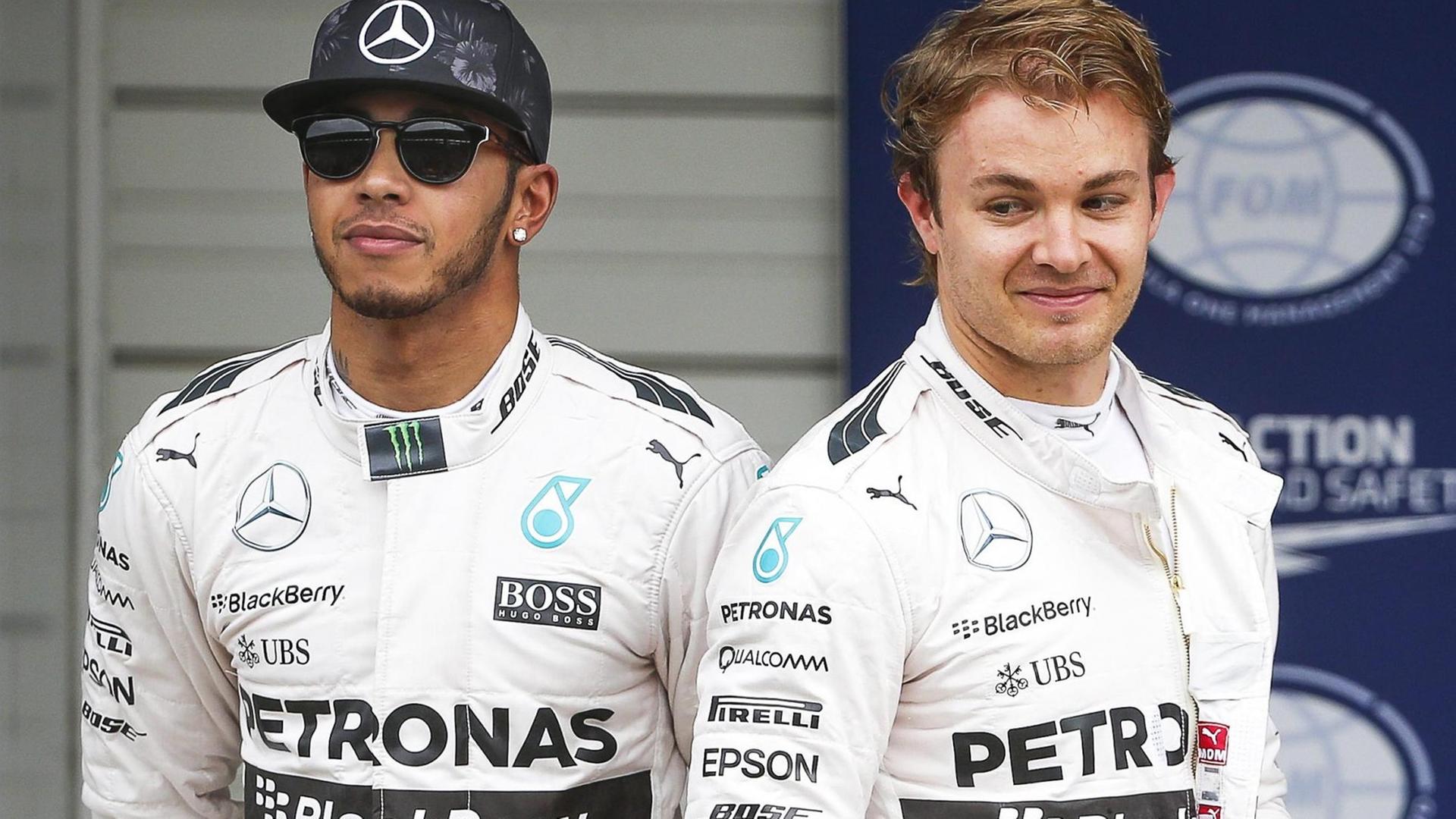Team-Kollegen und Konkurrenten: Die Mercedes-Fahrer Lewis Hamilton (links) und Nico Rosberg. Team-Kollegen und Konkurrenten: Die Mercedes-Fahrer Lewis Hamilton (links) und Nico Rosberg.
