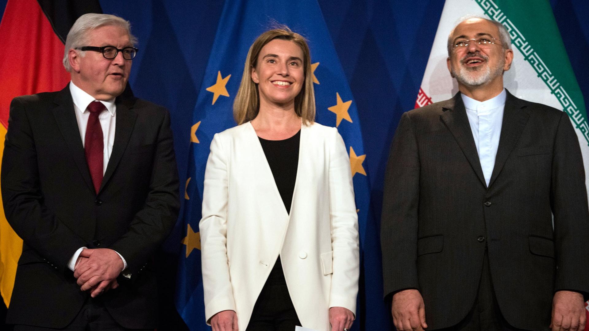 Bundesaußenminister Frank-Walter Steinmeier, die EU-Außenbeauftragte Federica Mogherini und der iranische Außenminister Javad Zarif