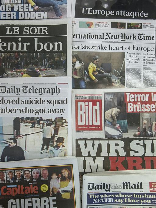 Titelseiten von Zeitungen nach den Anschlägen von Brüssel