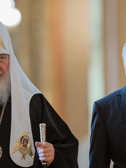 Der russische Präsident Wladimir Putin und der Patriarch der russisch-orthodoxen Kirche Kirill im Juli 2013 in Moskau.