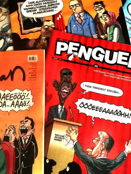 Die großen Istanbuler Satiremagazine: "Leman" und "Penguen" karikieren die Anweisung an Erdogans Bodyguards, kritische Demonstranten durch lautes Schreien selbst zu übertönen.