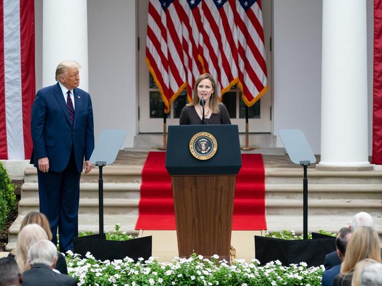 Sep 26, 2020 - Washington, District of Columbia, U.S. - US President DONALD J. TRUMP arrives with Judge AMY CONEY BARRETT, right, as his nominee to be an Associate Justice of the Supreme Court, during a ceremony in the Rose Garden of the White House. Judge Barrett, if confirmed, will replace the late Justice Ruth Bader Ginsburg. (Credit Image: © Shealah Craighead/White House/ZUMA Wire/ZUMAPRESS.com |