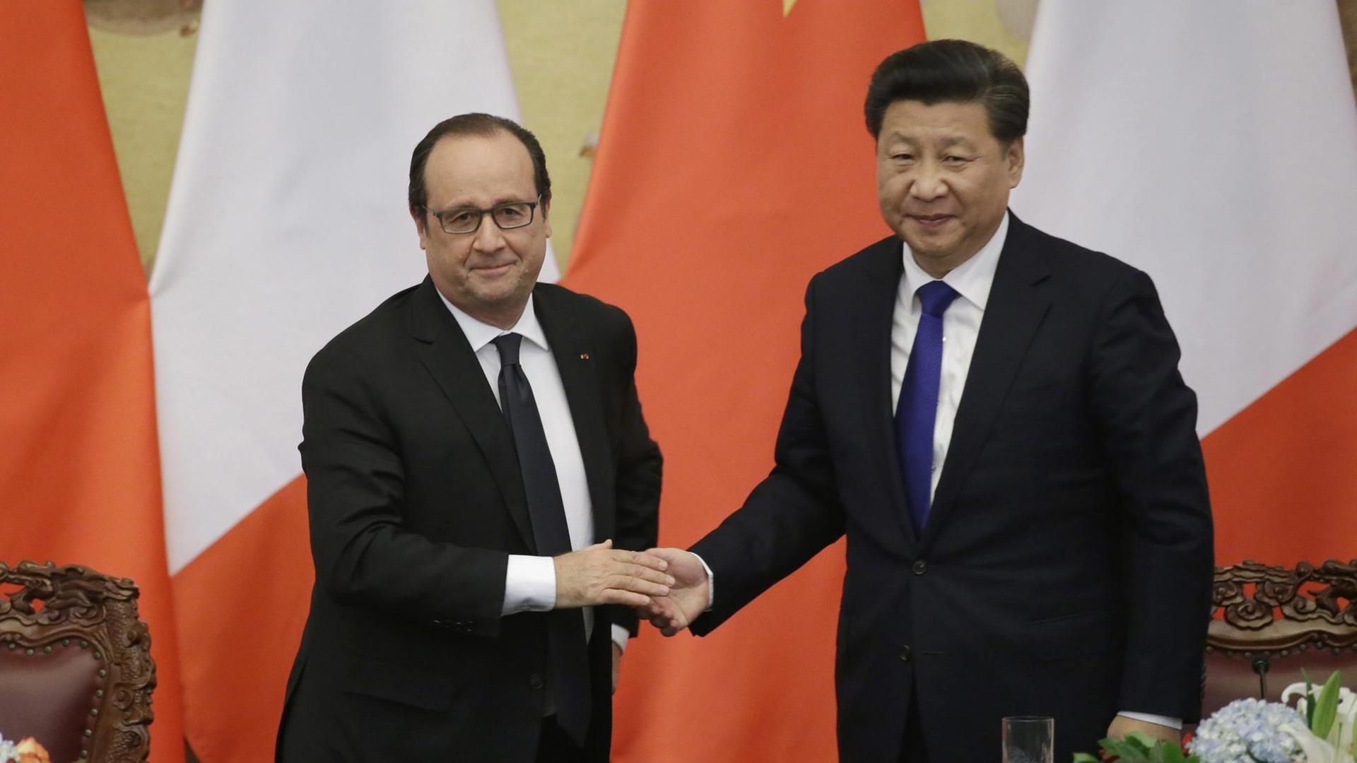 Frankreichs Präsident Hollande und der chinesische Präsident Xi