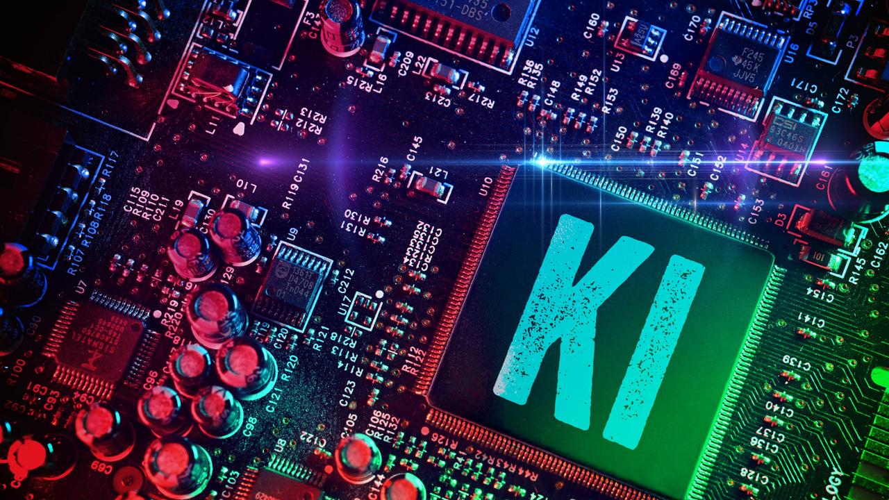 Ein Computerchip mit Aufschrift KI (Fotomontage)