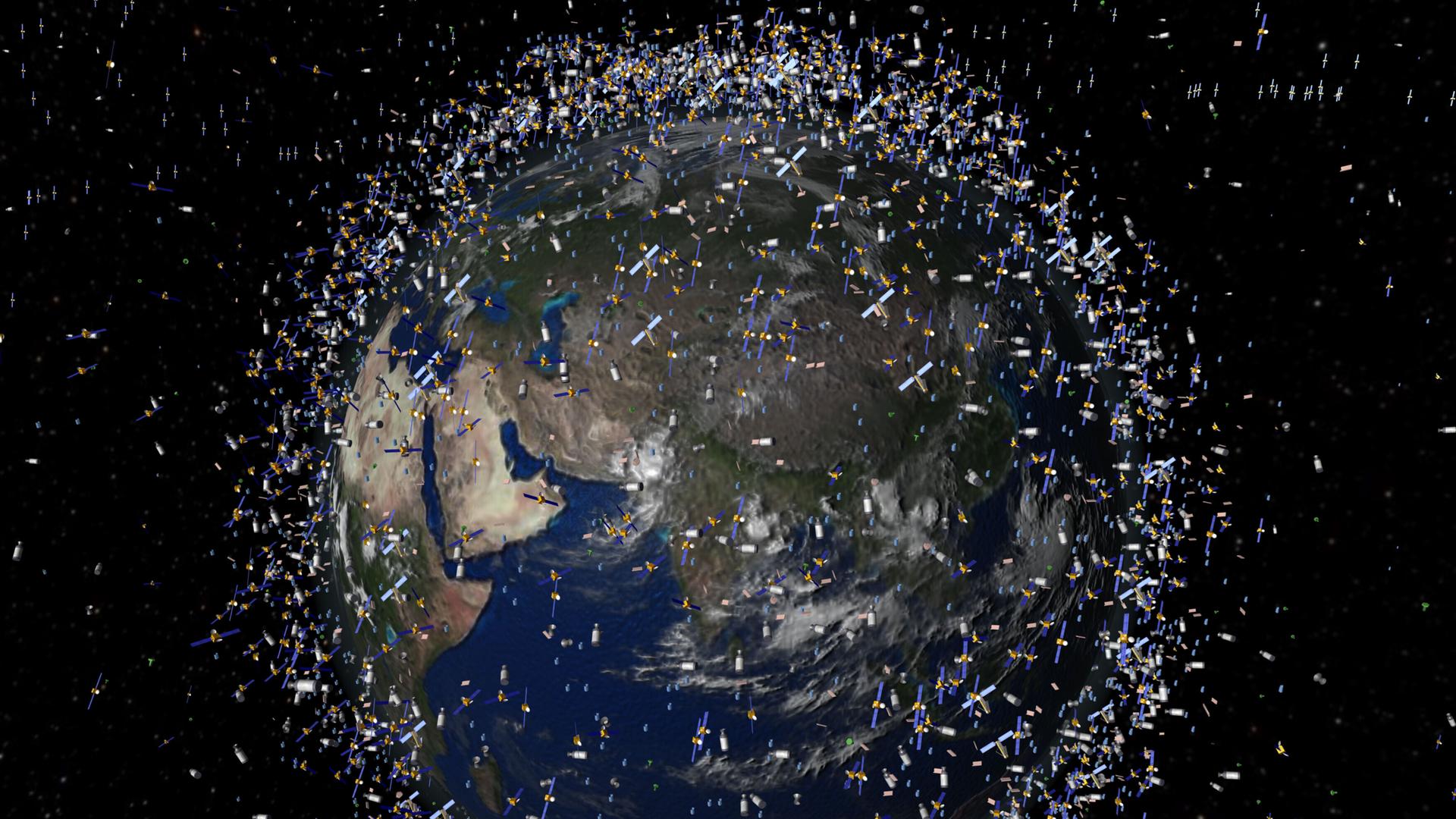 Darstellung des Weltraummülls: 20.000 Teilchen größer als 10 Zentimeter umkreisen die Erde. Auch im Weltraum gibt es Müll. Darstellung des Weltraummülls: 20.000 Teilchen größer als 10 Zentimeter umkreisen die Erde. Auch im Weltraum gibt es Müll.