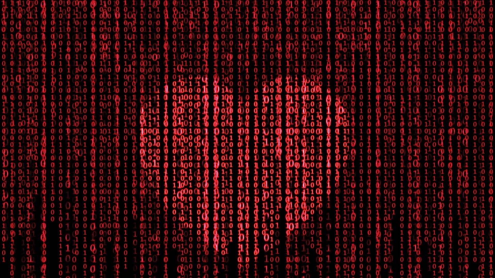 Aus einem roten Binärcode auf schwarzem Grund leuchtet ein Herz heraus. Aus einem roten Binärcode auf schwarzem Grund leuchtet ein Herz heraus.