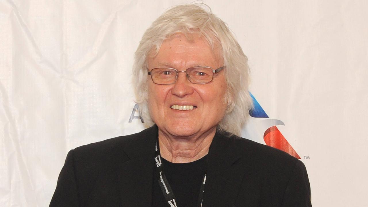 Chip Taylor lächelt in die Kamera.