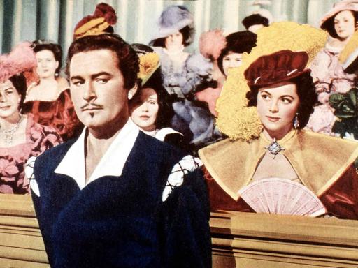 Wir sehen den Schauspieler Errol Flynn in der Rolle des Don Juan