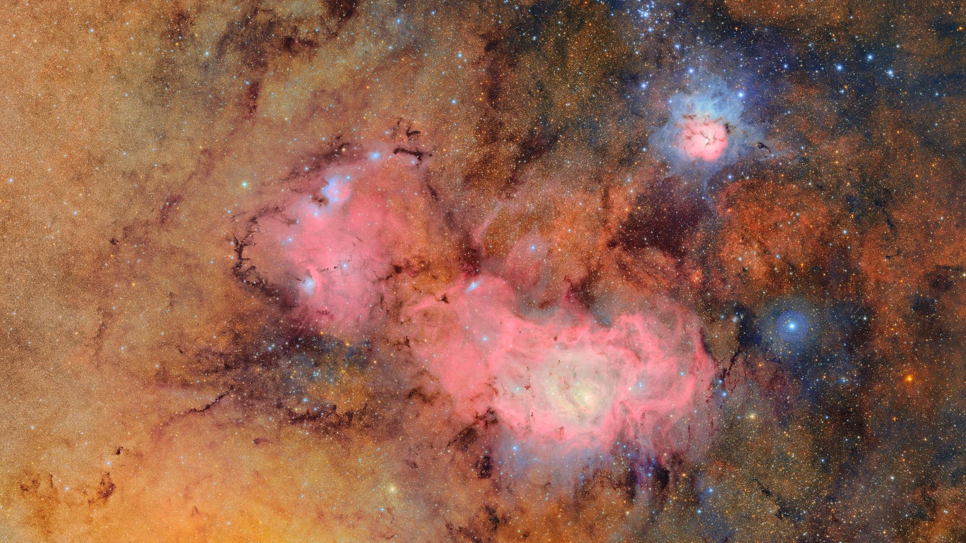 Dieses vom NSF-DOE Vera C. Rubin Observatory zur Verfügung gestellten Bild setzt sich aus 678 Einzelaufnahmen zusammen und es werden sonst schwache oder unsichtbare Details deutlich sichtbar - etwa die Gas- und Staubwolken, aus denen der Trifidnebel (oben rechts) und der Lagunennebel bestehen. Dieses vom NSF-DOE Vera C. Rubin Observatory zur Verfügung gestellten Bild setzt sich aus 678 Einzelaufnahmen zusammen und es werden sonst schwache oder unsichtbare Details deutlich sichtbar - etwa die Gas- und Staubwolken, aus denen der Trifidnebel (oben rechts) und der Lagunennebel bestehen.