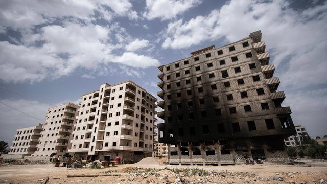 Bei Kämpfen zwischen islamistischen Gruppierungen, syrischen Sicherheitskräften und Drusen Anfang Mai 2025 beschädigte Häuser in Sahnaja, einer Stadt in der Nähe der syrischen Hauptstadt Damaskus. 

