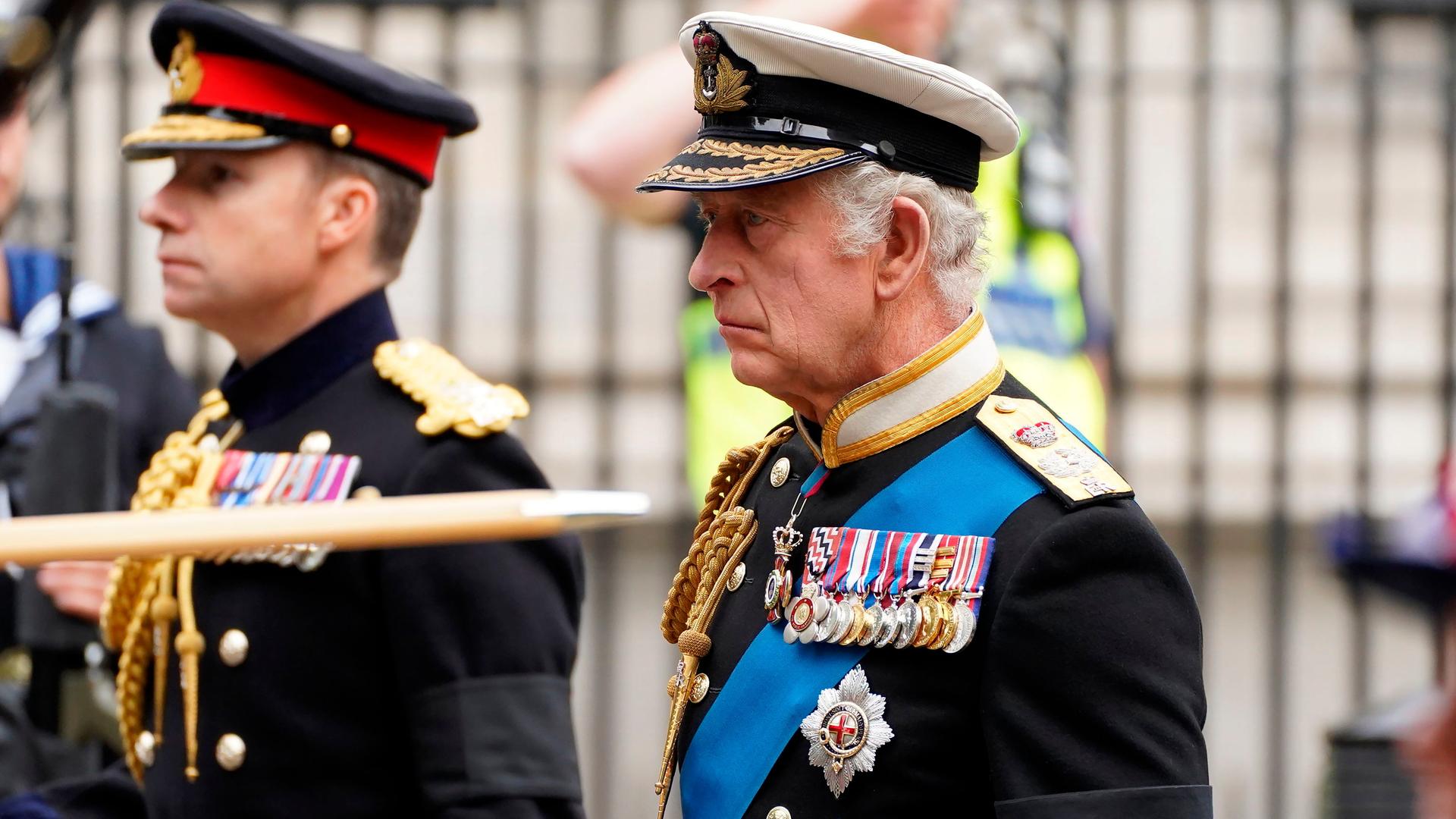 King Charles III, right, arrives at Westminster Abbey on the day of Queen Elizabeth II funeral in central London, Monday, Sept. 19, 2022. The Queen, who died aged 96 on Sept. 8, will be buried at Windsor alongside her late husband, Prince Philip, who died last year. ( James Manning/Pool Photo via AP)