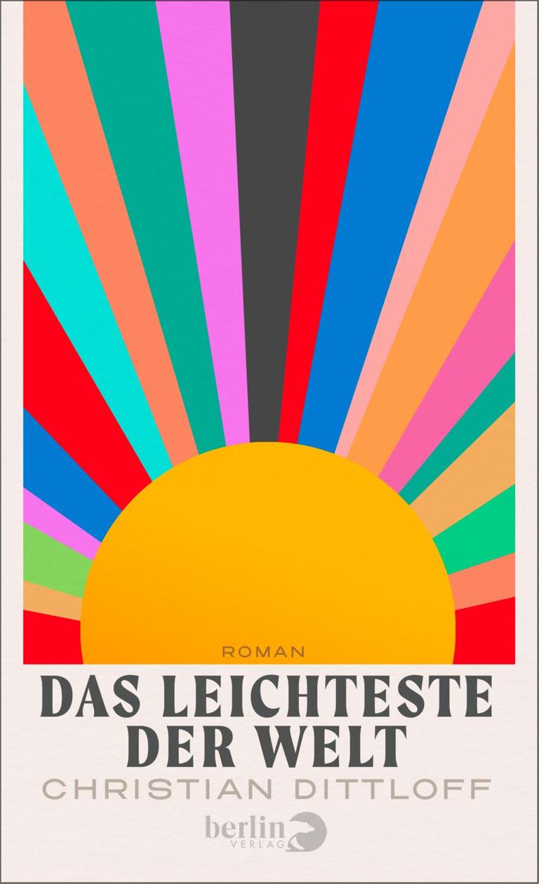 Über dem Titel ist eine Art gelbe Sonne gemalt von der viele bunte Strahlen abgehen Über dem Titel ist eine Art gelbe Sonne gemalt von der viele bunte Strahlen abgehen
