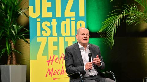 Bundeskanzler Olaf Scholz bei einem Podium auf dem evangelischen Kirchentag