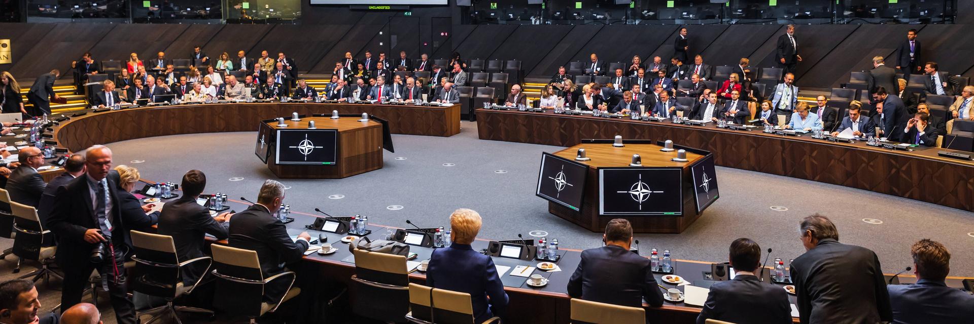 RECORD DATE NOT STATED BRUSSELS, BELGIUM - Jul 12, 2018: NATO military alliance summit. World leaders during a meeting of the North Atlantic Treaty Organization summit in Brussels , 35731560.jpg, alliance, atlantic, backstage, belgium, brussels, center, communication, conference, conversation, delegation, discussion, equipment, europe, european, event, group, headquarters, meeting, members, military, monitors, nato, negotiations, news, north, office, official, organization, participants, peace, people, policy, politics, safety, security, summit, talk, treaty, union, visit, work