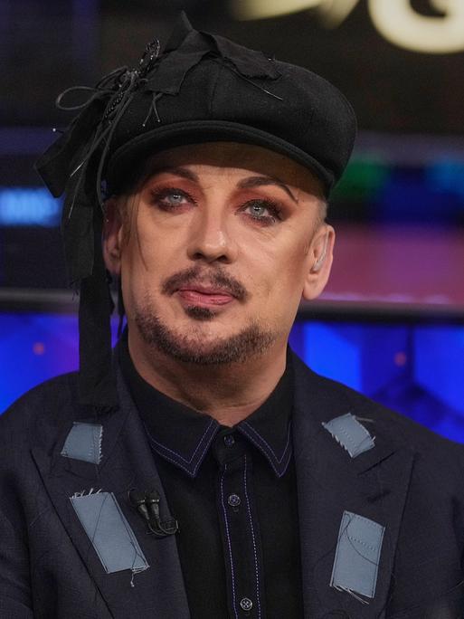 Singer Boy George is interviewed on the floor of the New York Stock Exchange, Monday, June 15, 2026. (AP Photo/Richard Drew)