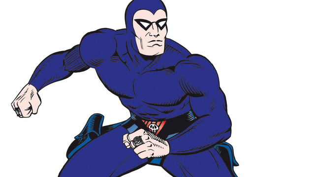 Comiczeichnung des Phantom: Ein muskulärer Mann mit Maske und hautengem lila Ganzkörperanzug.
