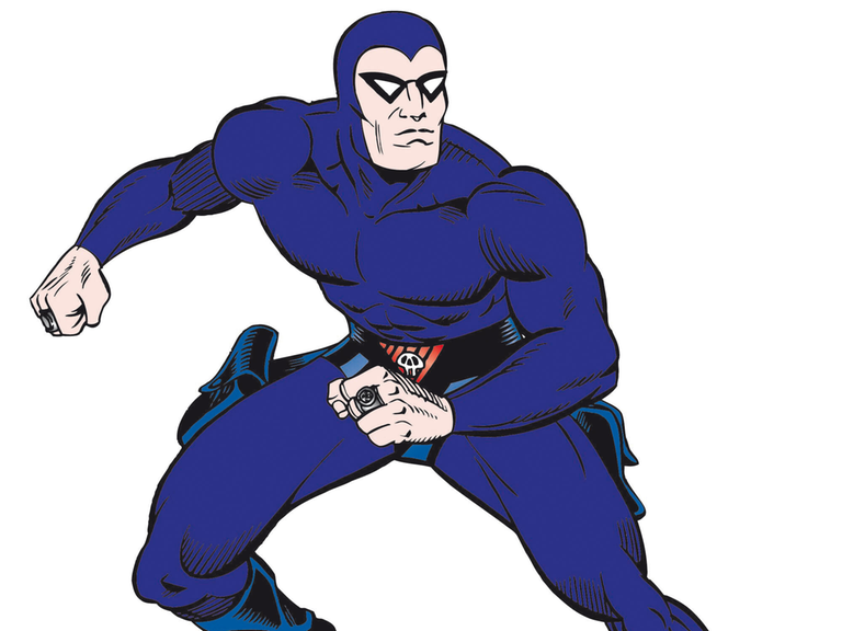 Comiczeichnung des Phantom: Ein muskulärer Mann mit Maske und hautengem lila Ganzkörperanzug.
Comiczeichnung des Phantom: Ein muskulärer Mann mit Maske und hautengem lila Ganzkörperanzug.