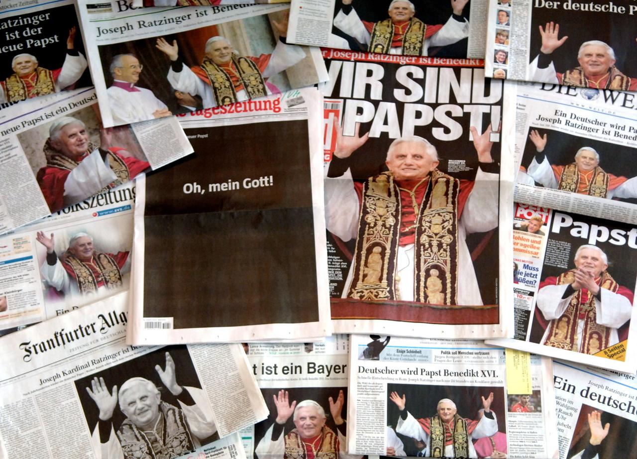 Die Titelseiten mehrerer Tageszeitungen vom 20. April 2005 machen mit ganzseitigen Porträts von Papst Benedikt XVI. auf. Auf einer Seite prangt die Schlagzeile "Wir sind Papst".