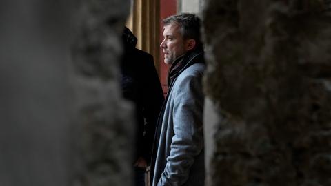 Gabriel Zuchtriegel, director of Pompeii Archaeological Park, walks in the 'peristylium', or courtyard, in the center of the Ancient Roman Domus Vettiorum, House of Vettii, in the Pompeii Archeological Park, near Naples, southern Italy, Wednesday, Dec. 14, 2022. One of Pompeii's most famous and richest domus, which contains exceptional works of art and tells the story of the social ascent of two former slaves, is opening its doors to visitors Wednesday, Jan. 11, 2023 after 20 years of restoration. (AP Photo/Andrew Medichini)