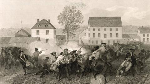 Historische Darstellung einer Kampfhandlung von Menschen mit Gewehren teilweise zu Fuß, teilweise auf Pferden.