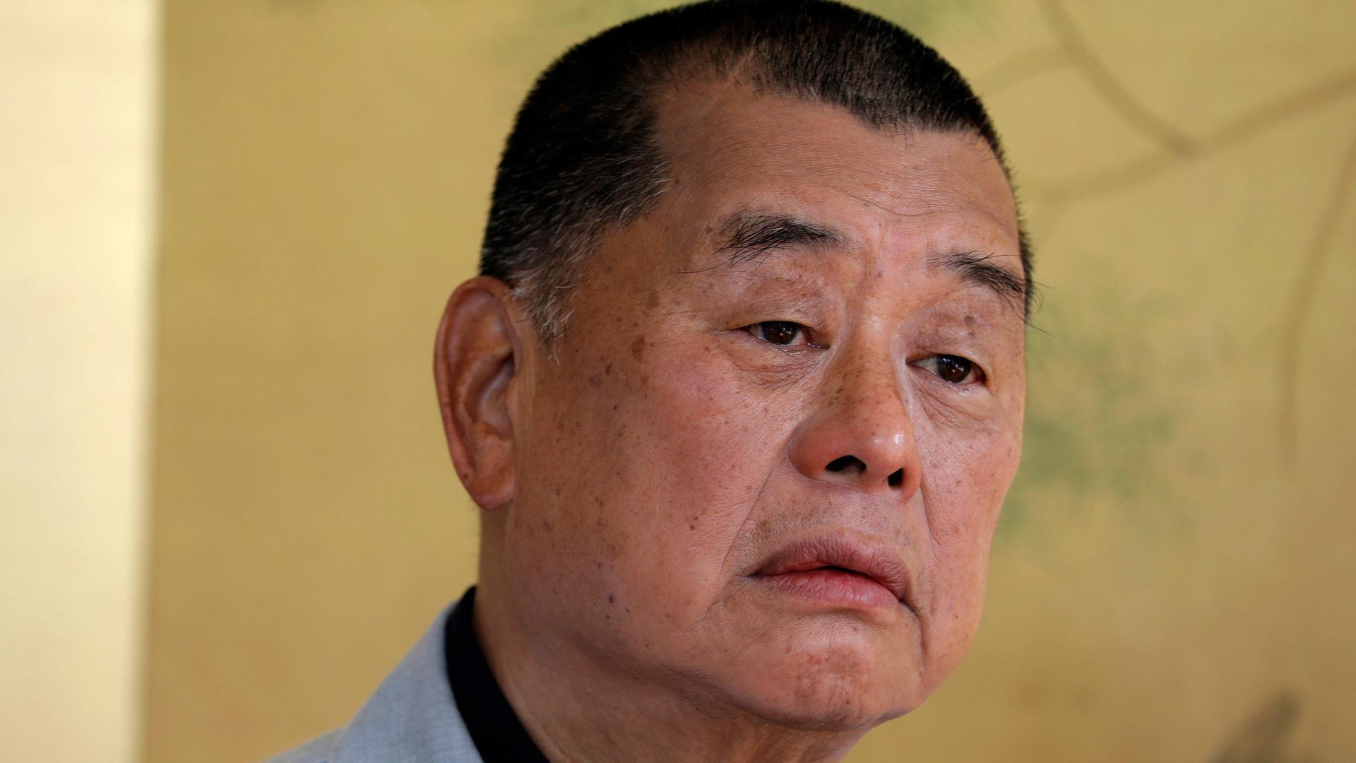 Ein Porträtfoto von Jimmy Lai Ein Porträtfoto von Jimmy Lai