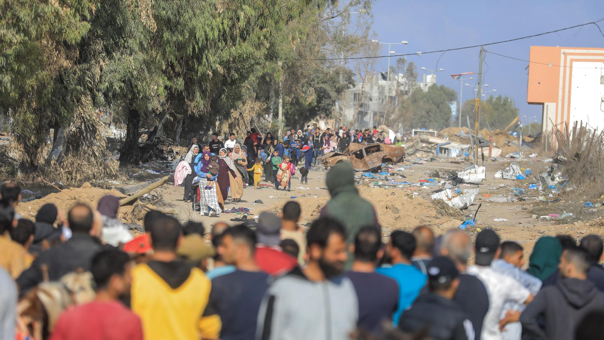 Palestinian families flee Gaza City and other parts of northern Gaza towards the southern areas amid ongoing battles between Israel and the Palestinian Hamas Group..