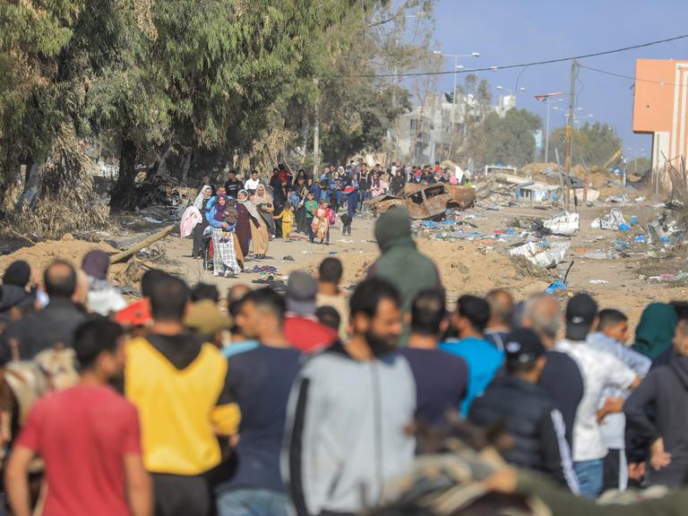 Palestinian families flee Gaza City and other parts of northern Gaza towards the southern areas amid ongoing battles between Israel and the Palestinian Hamas Group..