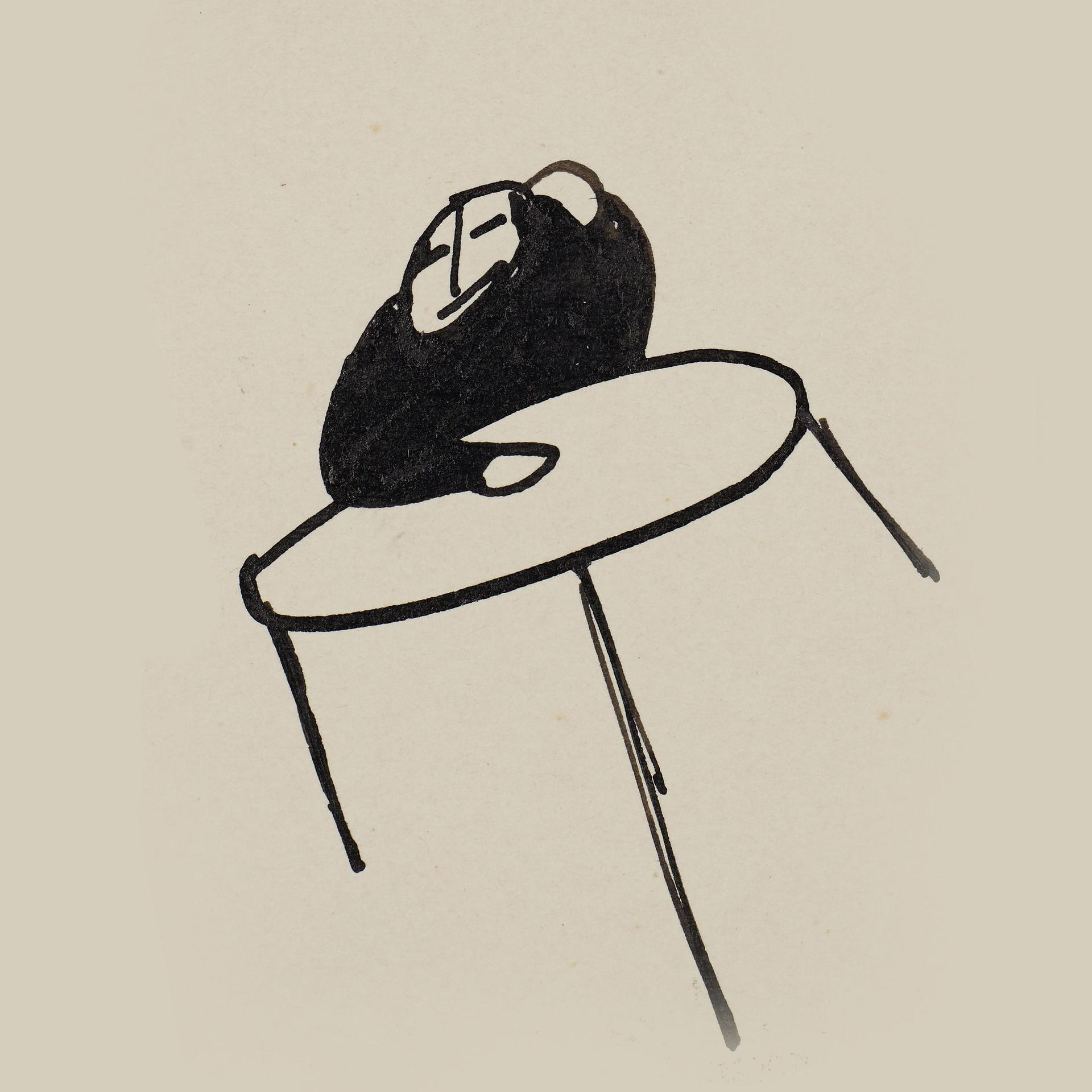 Kafkas Zeichnung eines Menschen an einem Tisch