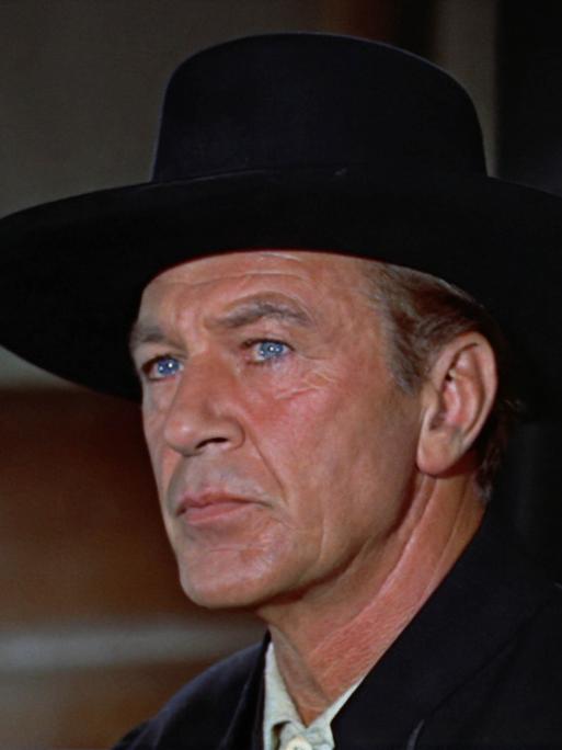 Gary Cooper mit schwarzem Hut und strengem Blick