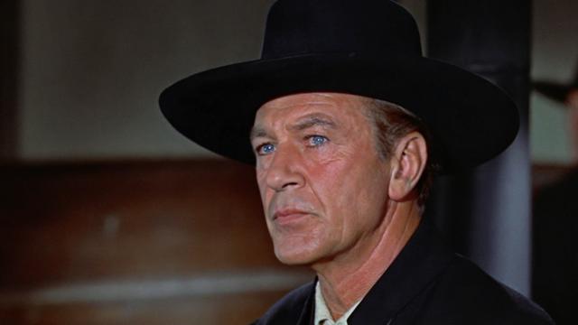 Gary Cooper mit schwarzem Hut und strengem Blick